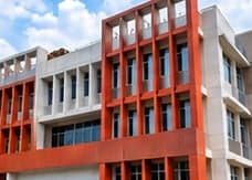 Red and white building under exterior construction