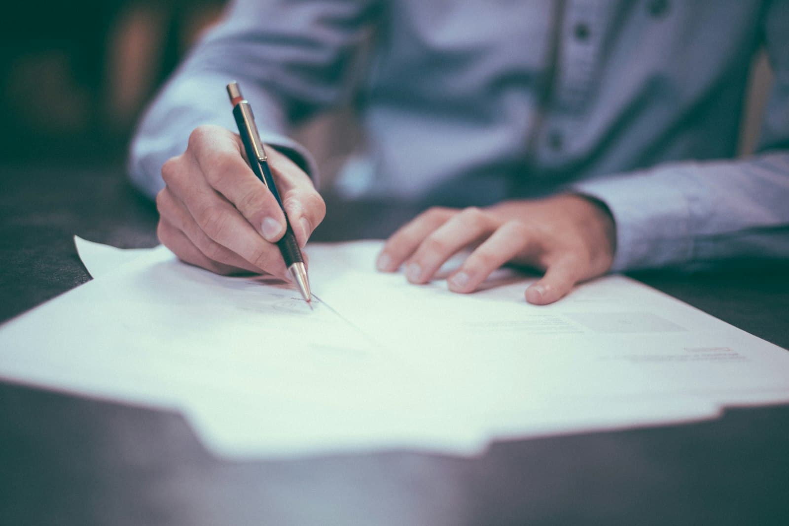 Detailed measurement documents and calculations on a desk