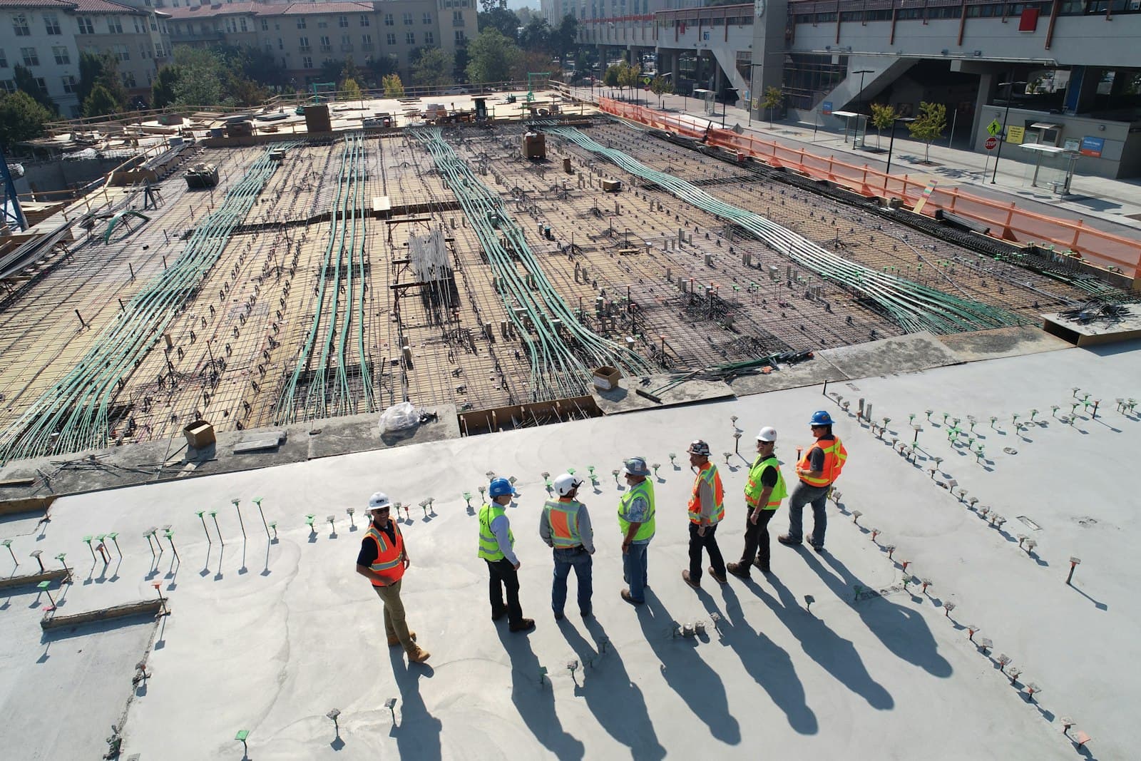 Concrete structure under construction with site team